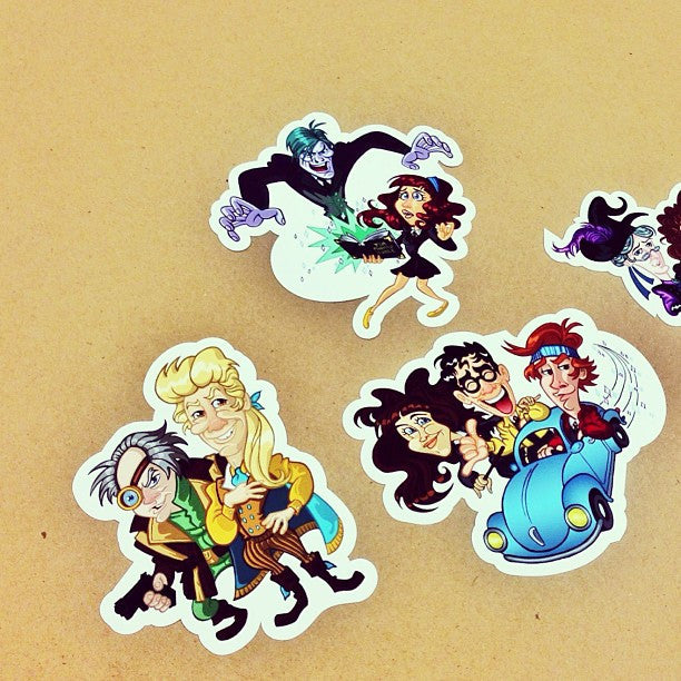 Three cartoon die cut stickers